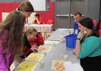 students and teachers playing activity