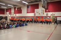 wide shot of students performing for p d students
