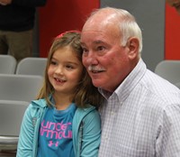 veteran smiling with student