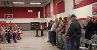 students clapping for veterans