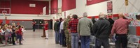 students continue signing patriotic song for veterans