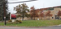 front lawn of chenango bridge with small flags on it