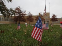 up close of small flag on lawn