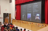 student speaking at veterans day assembly