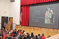 students speaking during veterans day assembly