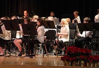 medium shot of students playing instruments