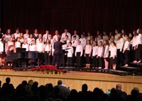 students singing on stage