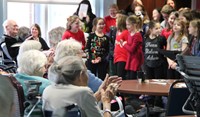 residents clapping for students