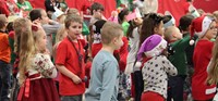 students dancing and singing