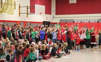 students dancing at holiday sing along