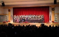 wide shot of students singing