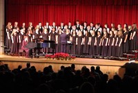 medium shot of students singing