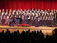 wide shot of students singing in chorus