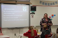 director of technology speaking with students about computer usage safety