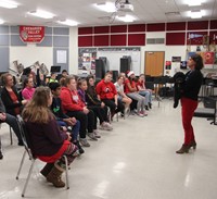 wide shot of bark 9 therapy dogs presentation