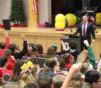 students raising hands to answer senator akshar question