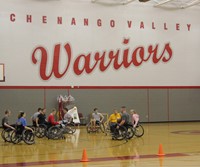 students taking part in wheelchair basketball