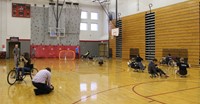 wide shot of students taking part in wheelchair activities