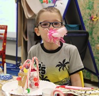 student with new years party favors