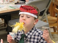 student with new years party favors