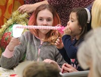 students with new years party favors