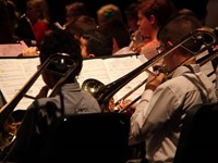 medium shot of students playing instruments