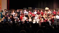 wide shot of students performing at winter concert