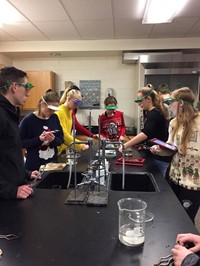 wide shot of students working in chemistry lab