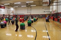 wide shot of drums alive event in gymansium