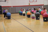 teachers and students playing to music beat