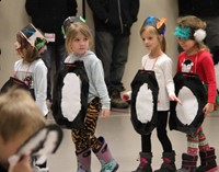 students parading around the gym 6