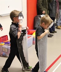 two students dressed as penguins