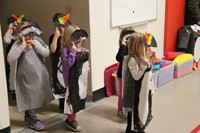 students dressed in penguin costumes