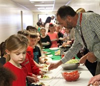 teachers serving students taco ingredients 2