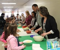 teachers serving students taco ingredients 1