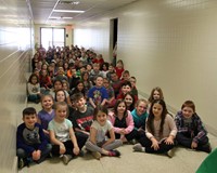 second grade students sitting