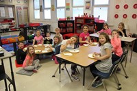 additional second grade classroom smiling