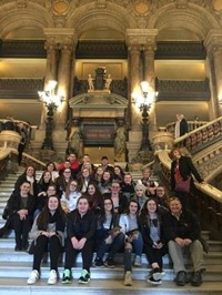 students sitting on stairs