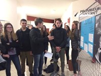 students looking at presentation