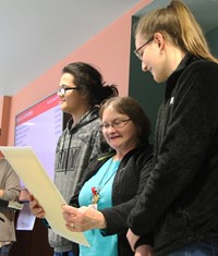 people looking at drawing