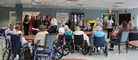 wide shot of nursing home dining room