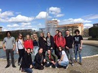 students standing in front of water fountain