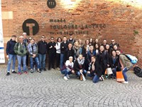 students in front of musee building