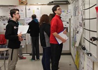 students looking at projects 8
