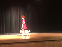 student dressed as Annie with dog