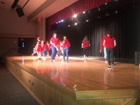 students dancing on stage