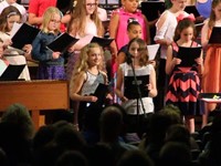 two students singing