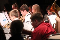 medium shot of students playing instruments