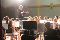 students performing from back of stage