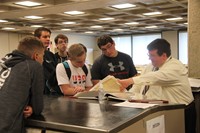 people looking at book